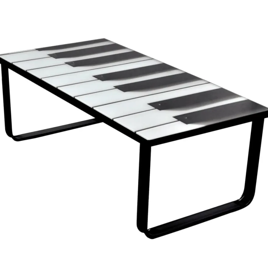 Sohvapöytä lasisella pöytälevyllä ja pianokuviolla